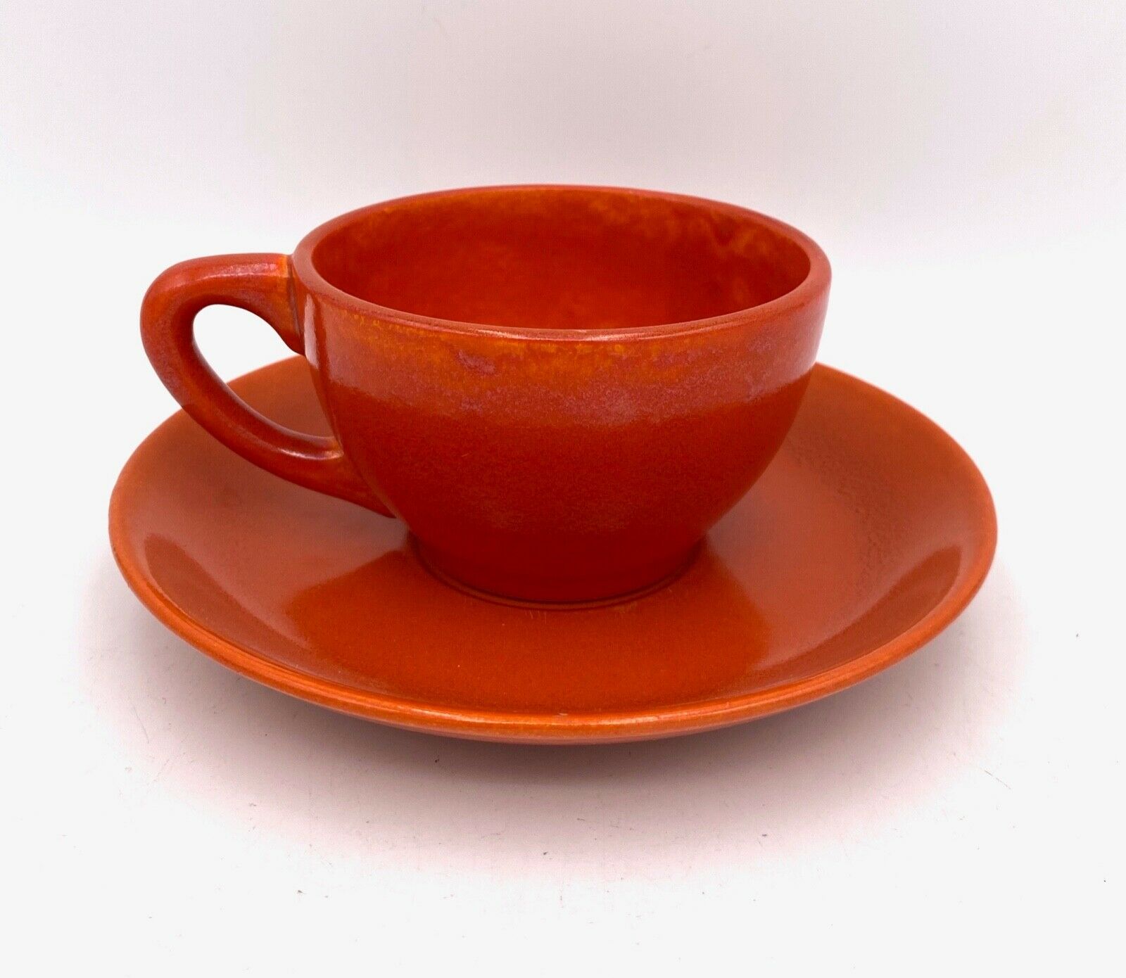 Franciscan Pottery Catalina Rancho Cup & Saucer - Radioactive Red Orange Glaze
